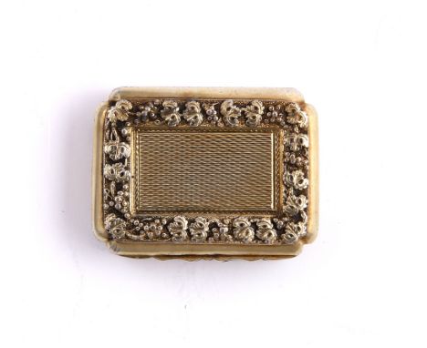 A Georgian silver vinaigrette of rectangular form with relief and engine turned decoration and gilded finish, Birmingham 1816
