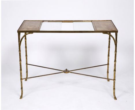 A brass rectangular backgammon table the frame stylised as bamboo, with inset leather top, 69cm high, 92cm wide