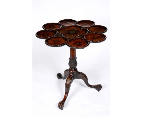 A George II brass and pewter inlaid mahogany tripod table in the manner of John Channon and Frederick Hintz, circa 1740, the 