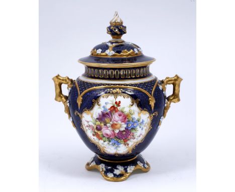 Royal Worcester porcelain pot pourri vase and cover circa 1907 with inner lid on a cobalt ground with painted reserve flower 