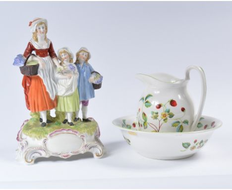 Yardley advertising figure group and an Old Foley small jug and basin