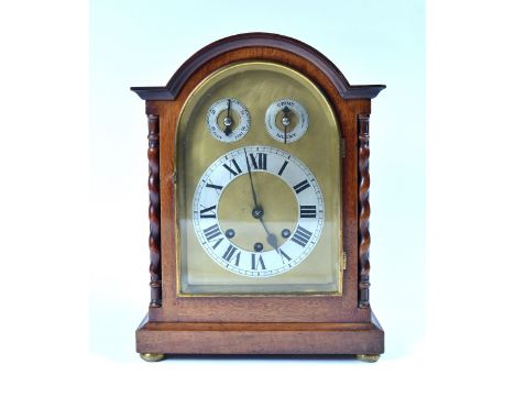 An Edwardian mahogany cased mantel clock with striking and chiming movement, 37cm