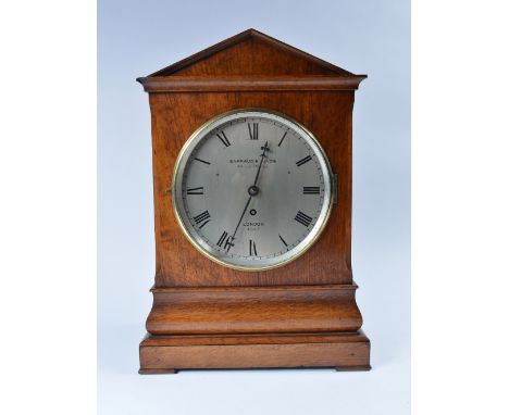 A Barraud & Lunds of London oak bracket clock with silvered dial, numbered 4867, 47cm