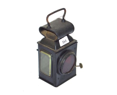 An Antique hand held lamp