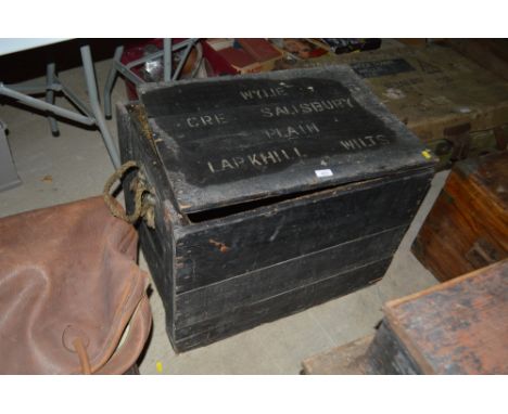 A painted storage trunk with metal lined interior
