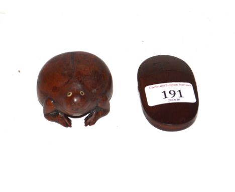 A carved treen frog snuff box and a mahogany pince-nez case