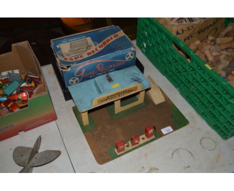 A scratch built 1950's toy petrol station, boxed toy tape recorder and a boxed back gammon set with rules