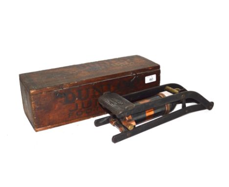 A Dunlop Junior foot pump, in original decorated wooden box