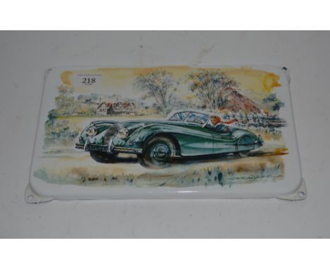 A Jaguar enamel wall plaque 13ins x 8ins