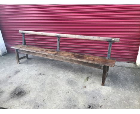 A late 19th Century pitched pine bench