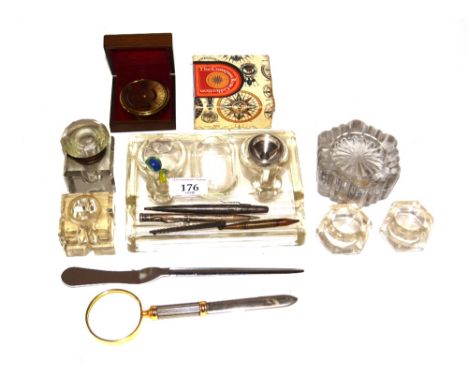 A glass desk stand, various ink wells, a paper-knife, compass etc.