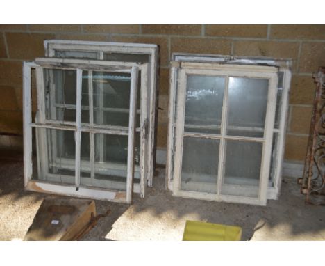 A quantity of old wooden sash windows
