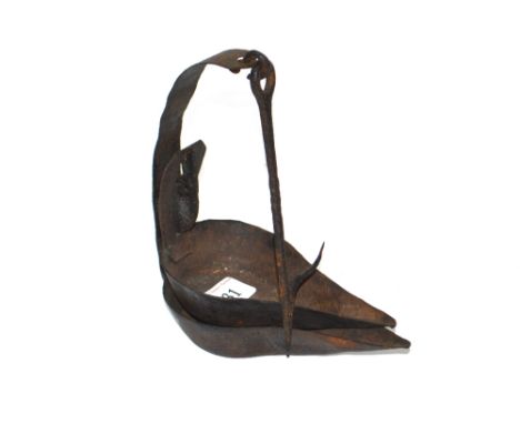 An Antique iron Tallo lamp