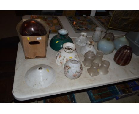 A quantity of various coloured glass and other oil lamp shades some AF