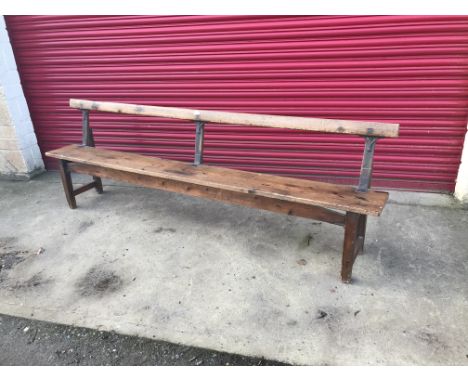 A late 19th Century pitched pine bench