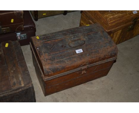 A japanned metal trunk