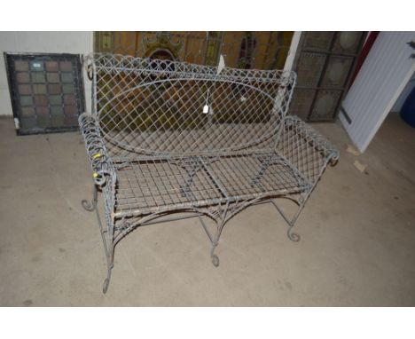 A wirework garden bench