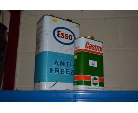 An Esso antifreeze can and a Castrol oil can