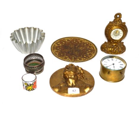 A brass alarm clock, ormolu type mantel clock, Middle Eastern cloisonne dish, Antique devil mask wall plaque etc.