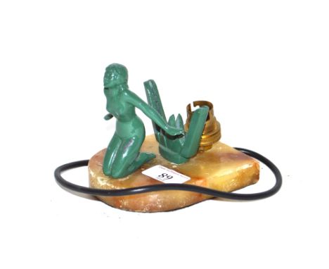 An Art Deco style onyx based table lamp, with painted kneeling girl decoration