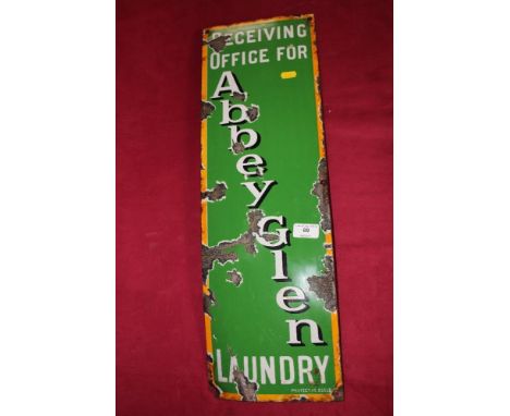 An enamel Abbeygien Laundry sign, (63cm x 20cm approx.)