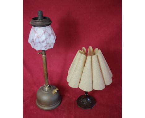 A brass fluted Corinthian column Tilley lamp with shade and an early Bakelite table lamp with shade