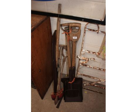 A quantity of various wooden handled vintage tools including a scythe, shovels, fork etc.