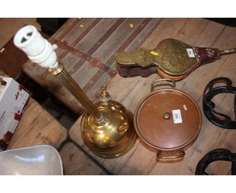 A brass Tilley lamp and a copper bowl with lid
