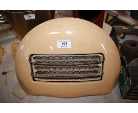 An old enamel 1950's electric fire