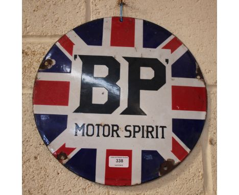 A circular enamel BP Motor Spirit advertising sign