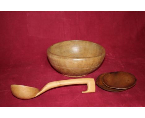 A beech wood dairy bowl; sycamore ladle and two early 19th Century elm butter platters