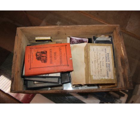 A box containing vintage military photo cards, many taken by A Mannall from Blaxhall in Suffolk; a Beginners Guide to Photogr