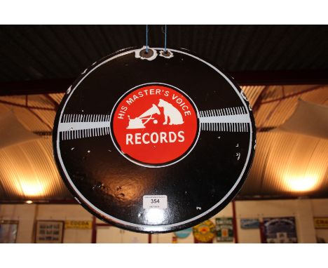 A circular enamel advertising sign for "His Master's Voice Records" , (355mm dia. approx.)