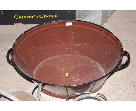 A large enamel brown bath