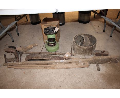 A harness makers vice; shoe last; old measures; Esso Blue oil stove with original box etc.