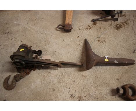An anvil tool and a Yale pull lift winch