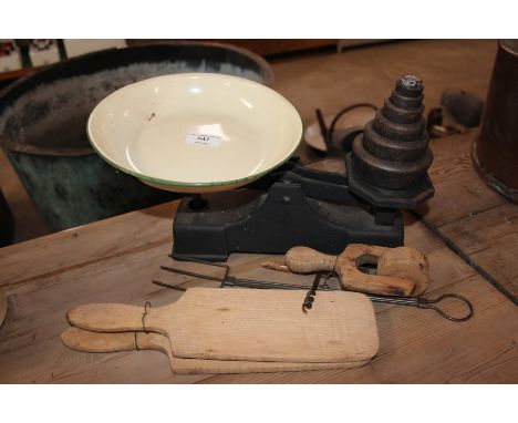 A small set of scales and weights; butter pats; toasting fork; corkscrew and a pastry marker