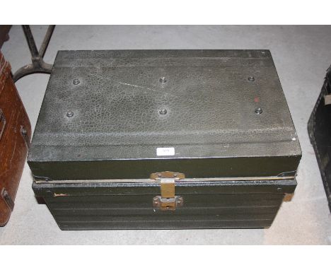 A metal travelling trunk and contents of various tools