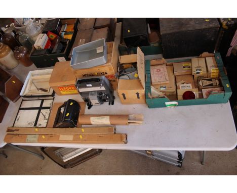 A Consul movie projector; Ilford flood lighting unit; and various other photographic equipment 
