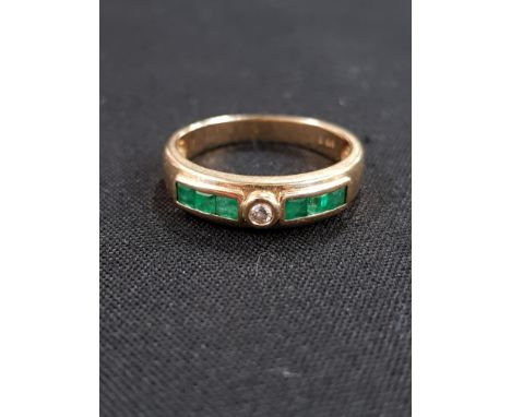 CHANNEL SET EMERALD AND DIAMOND RING 