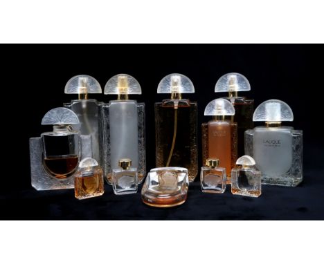 A COLLECTION OF VINTAGE LALIQUE SCENT BOTTLES including Eau de Parfum and Eau de Toilette, some with contents, others empty, 