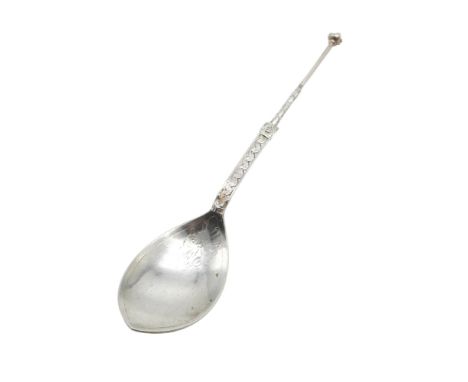 ALEXANDER RITCHIE;  An Iona silver spoon, the petal-shaped bowl with floral decoration, the terminal with celtic knotwork dec