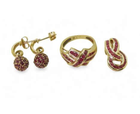 RUBY JEWELS A ruby crossover ring, mounted in yellow metal stamped '9', finger size K, with a 9ct gold QVC branded similar pe