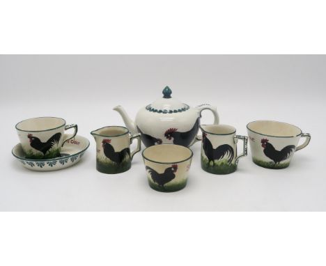 A COLLECTION OF WEMYSS WARE BLACK COCKEREL AND HEN PATTERN TEA WARES including a Bon Jour cup and saucer, single cup, two cre