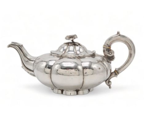 A WILLIAM IV SILVER TEAPOT by Charles Gordon, London 1833, of compressed melon form, with a floral finial and reeded s-scroll