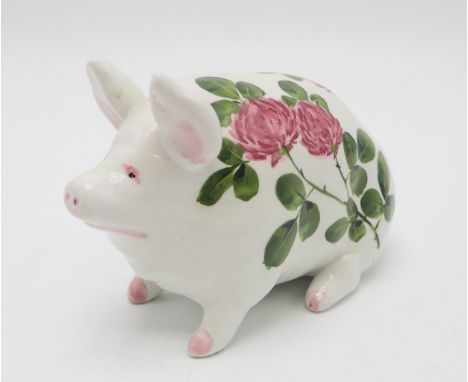 A SMALL WEMYSS WARE PIG painted with clover, painted and printed marks to base 16cm long Condition Report:overall light crazi