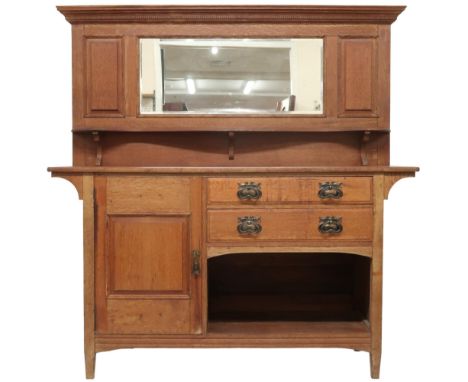 A LATE VICTORIAN OAK ARTS &amp; CRAFT MIRROR BACK SIDEBOARD&nbsp; with moulded dentil cornice over bevelled glass mirror pane