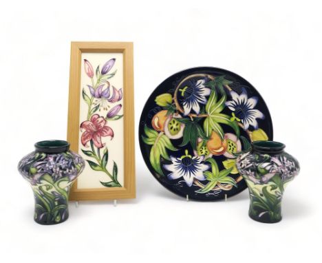 A MOORCROFT MEDITERRANEAN COLLECTION PASSION FRUIT PATTERN CHARGER designed by Rachel Bishop, 28cm diameter, a pair of Isis p