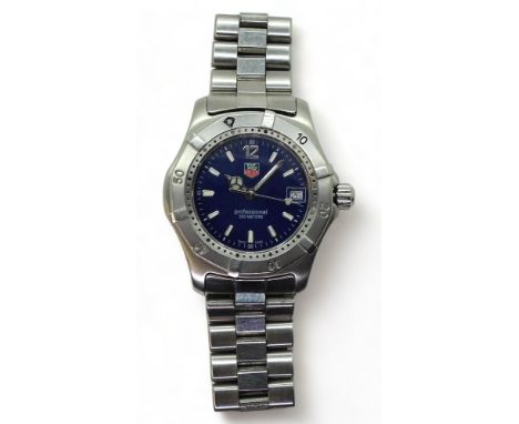 A LADIES TAG HEUER PROFESSIONAL 200M stainless steel case and strap, with a navy blue dial and white baton numerals. Numbers 