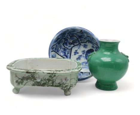 AN ARITA BLUE AND WHITE BASIN Painted to the interior with Kylin, squirrel and crane amongst pine, bamboo and foliage, the ex